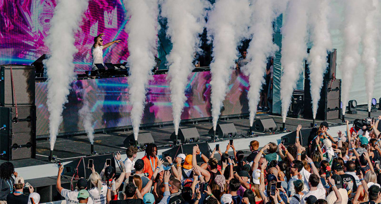 Outdoor music festival crowd and stage effects