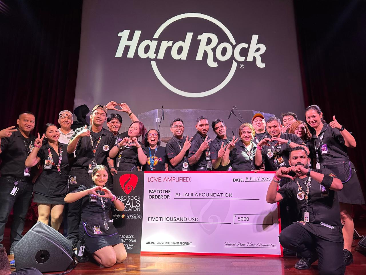 Hard Rock Heals $5,000 check reveal at Hard Rock Cafe Dubai